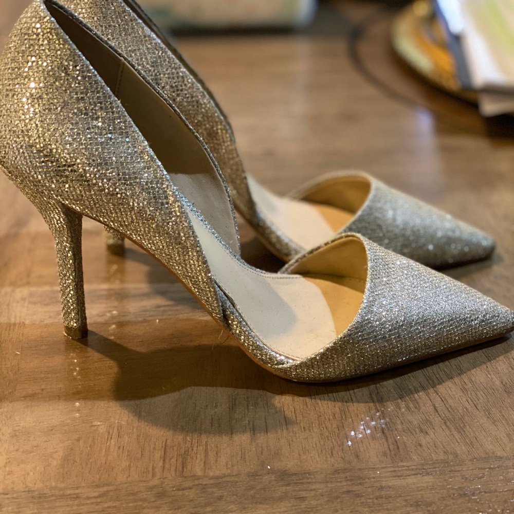 Michael Kors silver pumps